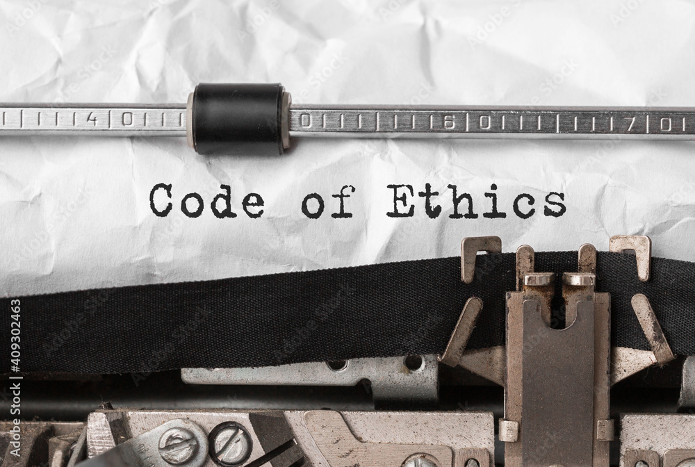 Poster text code of ethics typed on retro typewriter