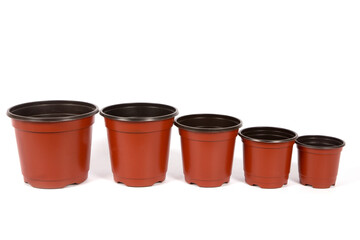 Plastic flowerpots isolated on a white background.