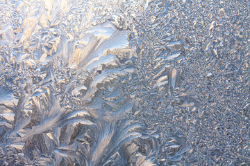 a winter window covered by frost