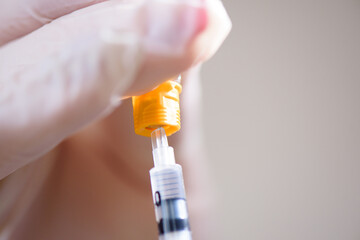 Coronavirus vaccine. A doctor makes a coronavirus vaccine at a hospital.