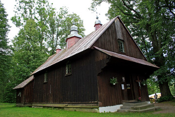 Fototapeta na wymiar Church of Saint Nicholas in Polana village - the oldest wooden church in Bieszczady Mountains, Poland