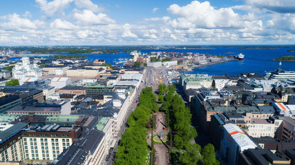 Fototapeta premium Scenic summer aerial panorama of the old town architecture in Helsinki, Finland. Beautiful sky with clouds. Travel concept.