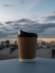 Morning coffee on the balcony or on the sky building and a nice view.