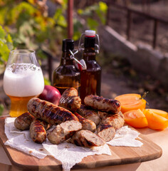 Grilled pork sausages and beer