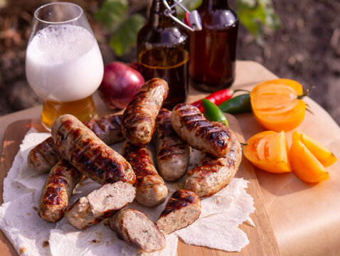 Grilled pork sausages and beer