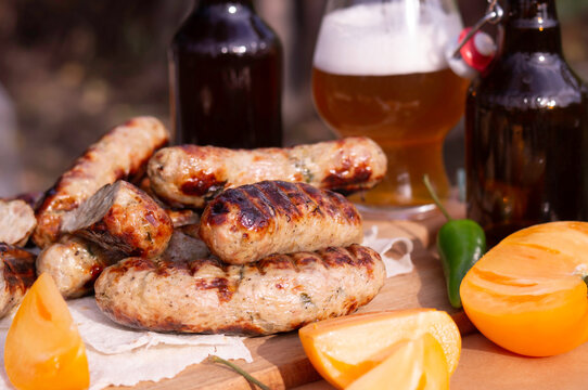 Grilled pork sausages and beer
