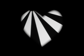 white heart on a black background with different patterns