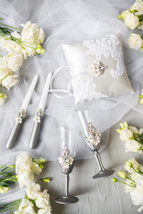 Wedding accessories, candles, ring pillow and wine glasses