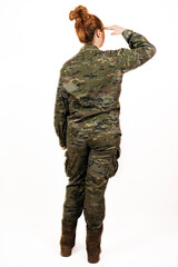 Back view of a woman wearing military uniform giving a military hand salute