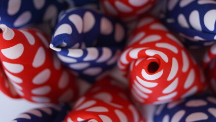 cotton fabric with a pattern is rolled into cones