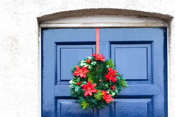 Fototapeta na wymiar Christmas wreath with plastic