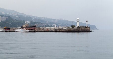 Fototapeta premium Coastal view of Yalta port at daytime