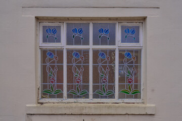 Blue and green lead stained window