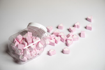 Marshmallows in the shape of a heart on background. Valentines day concept 