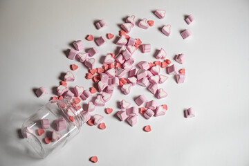 Marshmallows in the shape of a heart on background. Valentines day concept 