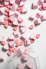 Marshmallows in the shape of a heart on background. Valentines day concept 
