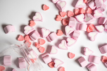 Marshmallows in the shape of a heart on background. Valentines day concept 