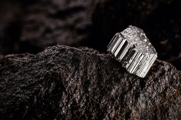precious stone, silver ore on rock. Luxury concept, rare material