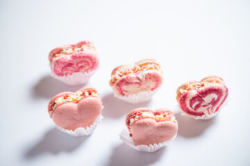 Sweet macaroons in the shape of a heart for Valentine's Day, sweets for Valentine's Day