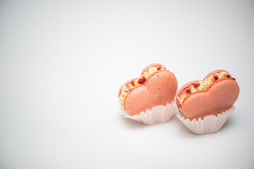 Sweet macaroons in the shape of a heart for Valentine's Day, sweets for Valentine's Day