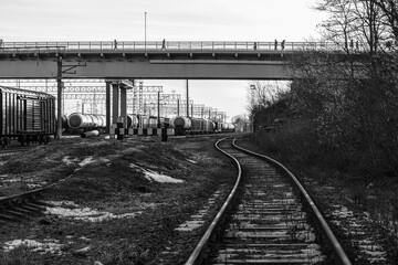 black and white photo of a railroad track
