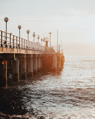 Pier at sunset in the sea