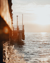 Pier at sunset in the sea