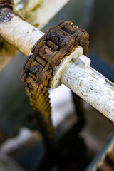 Small chain gear. Steel structure in the dam.