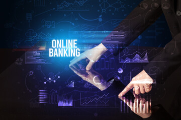 Businessman touching huge screen with ONLINE BANKING inscription, cyber business concept
