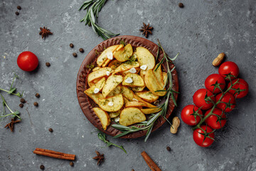 roasted rosemary garlic potato wedges on a plate