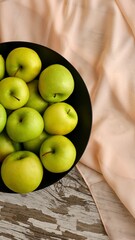 Apples on the black plate 