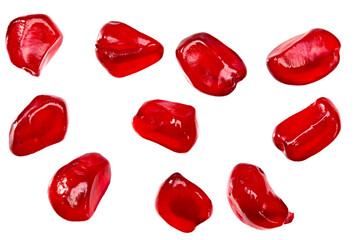 Fototapeta premium pomegranate seeds isolated on white background. pomegranate berries. top view