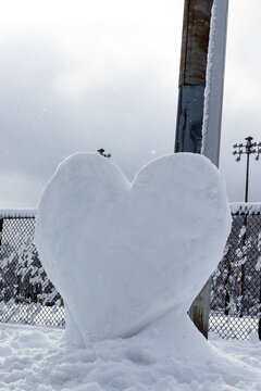 Heart Shaped Snow And Ice Sculpture In A Park In Montreal, Vertical Image