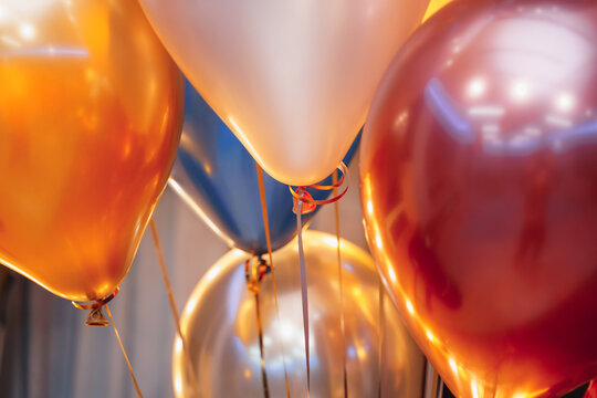 A bunch of beautiful chrome helium balloons for a child's birthday