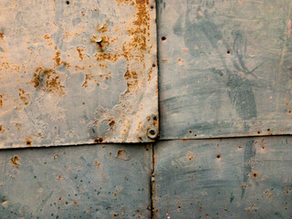 Rusty metal background. Cross lines. Blue 