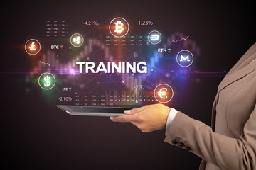 Close-up of a touchscreen with TRAINING inscription, business opportunity concept