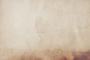Old brown paper grunge background. Abstract liquid coffee color texture.