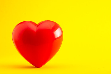 Red heart on yellow color background, Valentine's day greeting card, copy space for your text