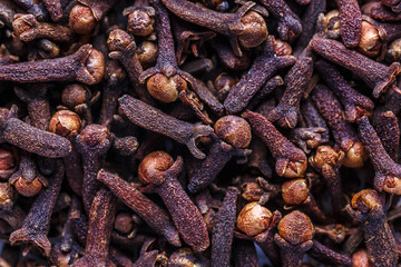 Cloves spice. A mixture of different spices close up. Textures of colorful spices and condiments.Colorful Herbal and Spices Oriental.Various Indian spices