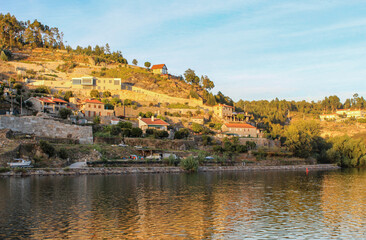 Fototapeta na wymiar Beautiful landscape sunset over village in mountain and river, in Castelo de Paiva, Douro Valley, oporto, Portugal