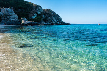 Clear turquoise sea waters at Grotticelle beach, Capo Vaticano, Calabria, Italy