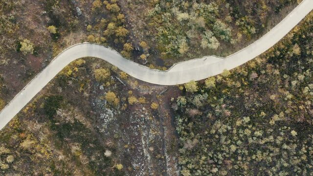 Aerial view on a road with lava coming over it.