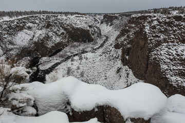 Canyon rim of the Crooked river in winter. Central Oregon, USA