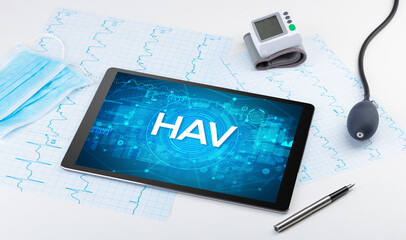 Close-up view of a tablet pc with HAV abbreviation, medical concept