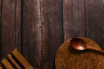 Simple and dark mood of a wooden table for background purposes.