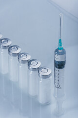 Medicine, Injection, vaccine and disposable syringe, drug concept. Sterile vial medical syringe...