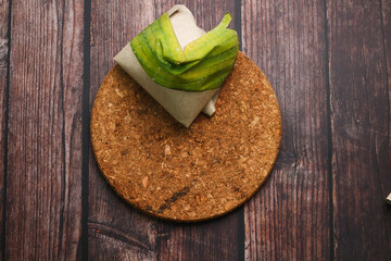 Asian and Malay morning breakfast. Nasi Lemak on top of wooden table.