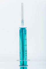 Medicine, Injection, vaccine and disposable syringe isolated, drug concept. Sterile vial medical. Medical Syringe needle. Macro close up on backgrounds gray.