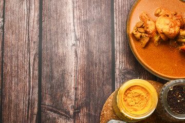 Chicken curry and Nasi Lemak for breakfast in Asian.