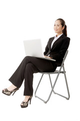 Business lady in the use of notebook computer